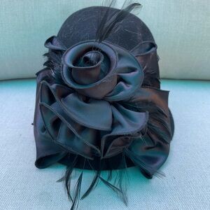Felt, feather, and satin rose front hat , brand new black adjustable inside